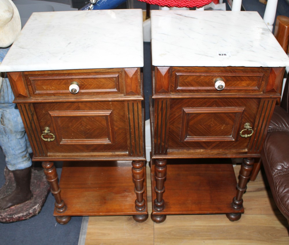 A pair of early 20th century French walnut bedside cupboards, with white marble tops, W.40cm D.39cm H.82cm